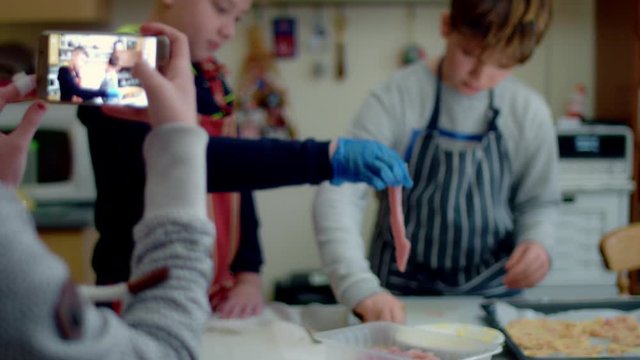 4k Kitchen Shot of Children Preparing Food and Taking Selfie