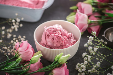 Homemade berry ice cream on rustic background