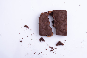 brownies with macadamia nuts on white background