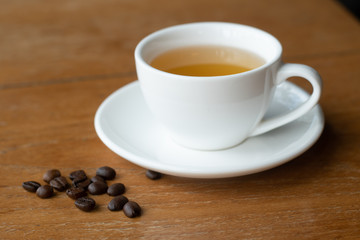 Hot tea cup on wood table