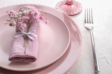 Beautiful table setting on white background, closeup