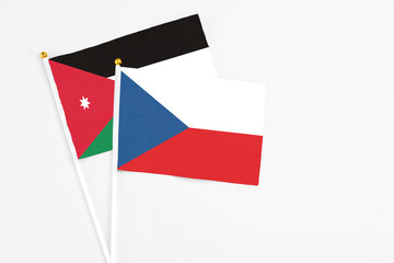 Czech Republic and Jordan stick flags on white background. High quality fabric, miniature national flag. Peaceful global concept.White floor for copy space.