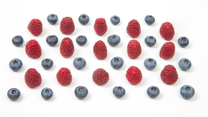 raspberry and blueberry on a white background. Vitamins and wholesome foods