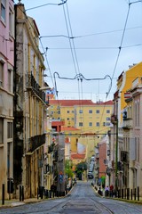 Fototapeta premium Narrow street in the Lisbon city Portugal 30.Oct.2019 It is famous for its beautiful labyrinthine streets