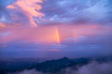 Fototapeta na wymiar rainbow over mountain
