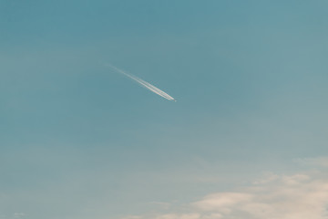 View of the condensation trails of airplane in the sky