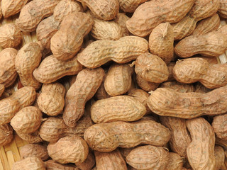 Top view of a pile of raw peanuts also called groundnut. Food concept. With edible seeds and high oil content. Oil crop. Common ingredients in Taiwan. Could be background.