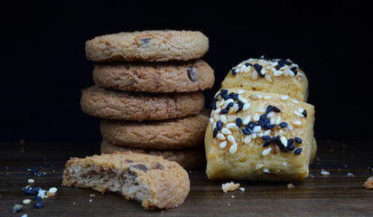 chocolate chip biscuits on black background