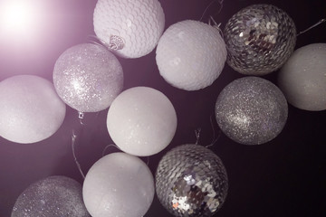 Beautiful christmas balls on black background.