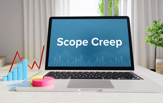 Scope Creep – Statistics/Business. Laptop in the office with term on the Screen. Finance/Economy.
