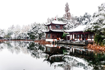 The beautiful Snow winter landscape scenery of Xihu West Lake and pavilion with garden in Hangzhou China.