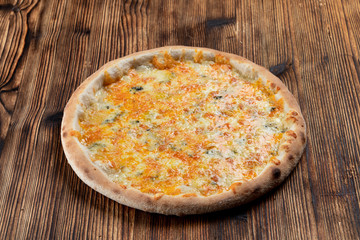 Hot four cheese pizza with melted mozzarella, cheddar, parmesan and blue cheese