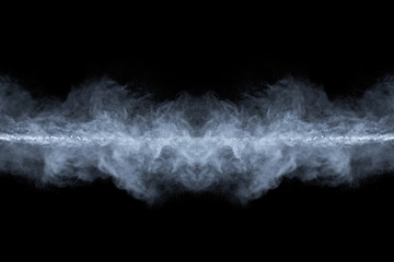 White powder explosion on black background. Colored cloud. Colorful dust explode. Paint Holi.