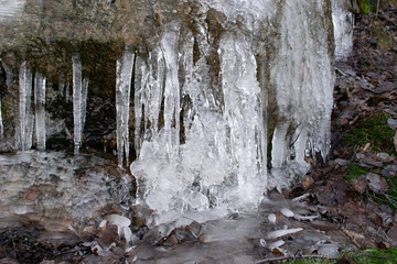 frozen waterfall in forest
