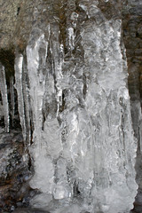 frozen waterfall in forest