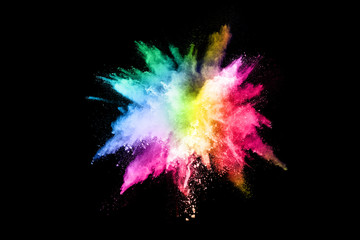 abstract colored dust explosion on a black background.abstract powder splatted background,Freeze...