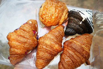 A box of butter and chocolate croissants