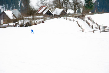 Skiers rest in the Ukrainian Carpathian village in winter.