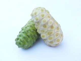 Noni,Great morinda, Tahitian noni, Indian mulberry, Beach mulberry (Morinda citrifolia L. ) on white background.
