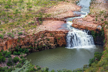 Aerial landscape view of the unnamed waterfall on the DeLancourt River in the remote Kimberley Region of Western Australia in the Wet Season.
