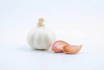 Head and clove garlic isolated on a white background.