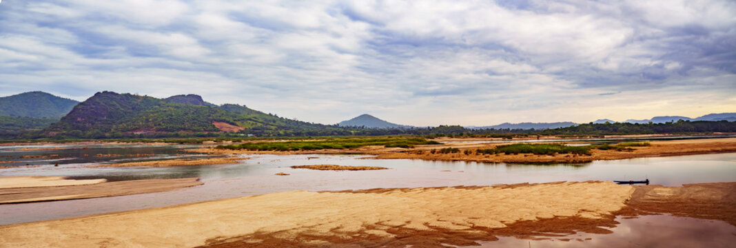 Panorama from Mekong River. Wide angle point to view the mountain range and dramatic sky. Province Loei, unseen in Thailand © monster_code