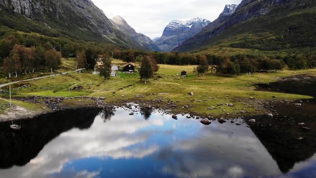 Low flown aerial shot of the beautiful innerdalen in norway, beautiful summerday