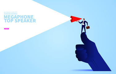 Speech leader, businessman holding a megaphone standing on a huge thumb