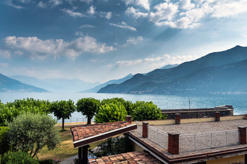 Fototapeta premium Como lake coasts in hot summer morning, Lombardy, Italy.