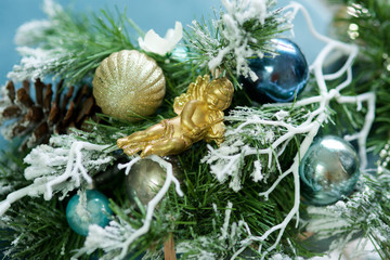 Elegant decorated with balls and figures Christmas tree.