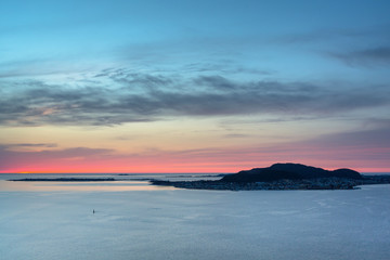 Fototapeta premium Sunset over the Norwegian Sea near Alesund, Norway