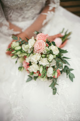 bouquet in the hands of the bride