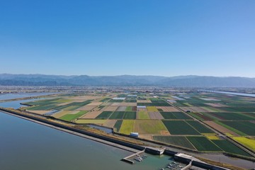 A vast farmland facing the sea