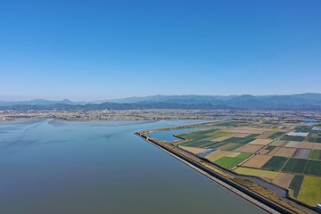 A vast farmland facing the sea