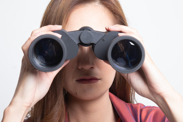 Young Asian woman with binoculars.