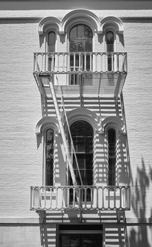 Black and white picture of an old fire escape, New York, USA.