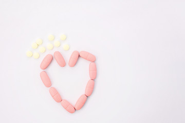 Herbal capsule from herbs nature for good health, vitamin, mineral supplement pills for medication disease on wooden medical background with copy space, medicine and drug concept