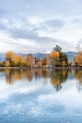 Fototapeta na wymiar lake of Puigcerda AND SCHIERBECK PARK, town in Girona, Catalonia, in the midst of gardens rich in willows, conifers and other essences, the shores of this man-made lake are lined in pretty villas
