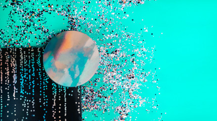 Colorful Sparkling Glitter confetti. Christmas Holidays abstract background, ispired by neo mint, color of 2020, holographic paper for your text