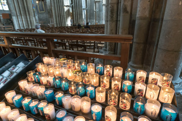 close up of votive candles in the cathedral of Rouen