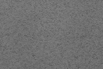 Blurred background texture of old gray paper. Grains.