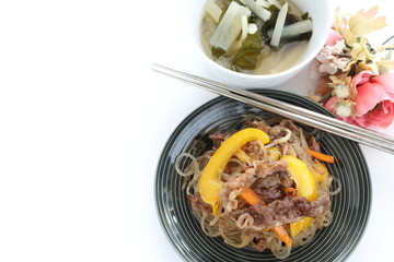 Korean food, yellow paprika and beef Japchae glass noodles