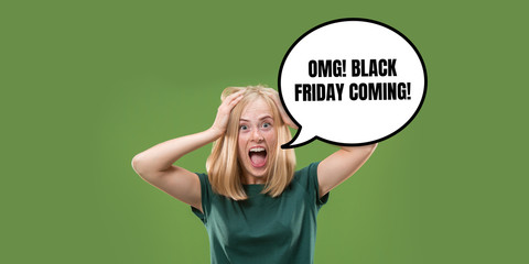 Portrait of woman with speech bubble on green background. Copyspace for your advertising. Black friday, cyber monday, sales, money and cash, online purchases and payments. Crazy screaming.