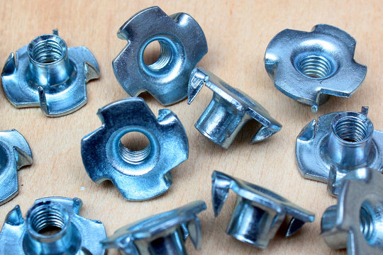 Pronged tee nuts for wood. Steel threaded rivet nuts.