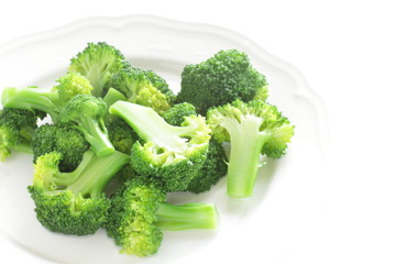boiled broccoli on dish for healthy Chinese food image