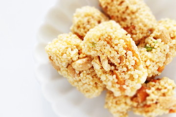 Asian confectionery, rice cracker on dish with copy space