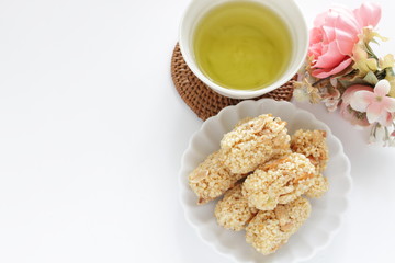 Asian confectionery, rice cracker on dish with copy space