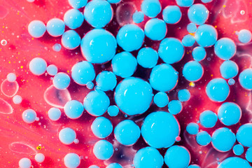 Bright Colors Bubbles Slow Motion Oil Ink. Structure of colorful chaotic motion bubbles. Bright Colors Bubbles. Pink and blue Bubblegum flavor background. Drops of colors Abstract Pattern. Pop Bubble