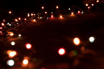 Fototapeta na wymiar Bright fairy lights. New year holidays is near. Be prepared.