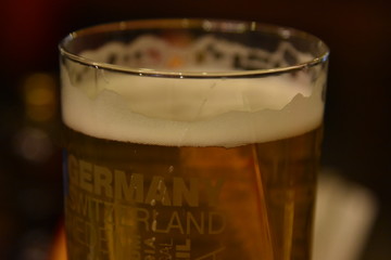 A glass of beer on the table